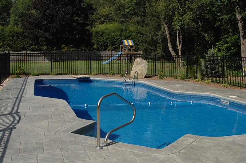 Swimming pool and stamped concrete project example 121
